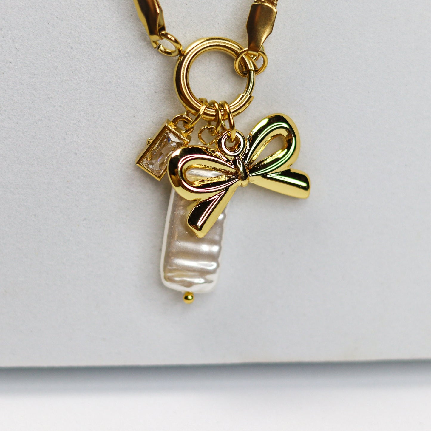 Radiant Ribbon Charm Necklace - Adorn-iq